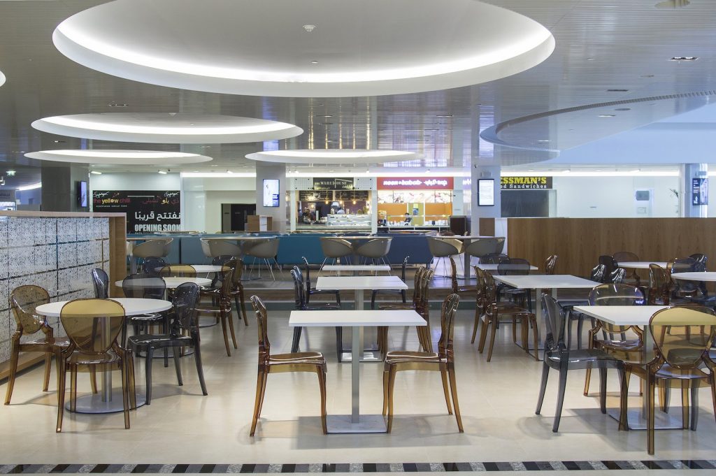 Chairs and table of Jafza One food court in dubai
