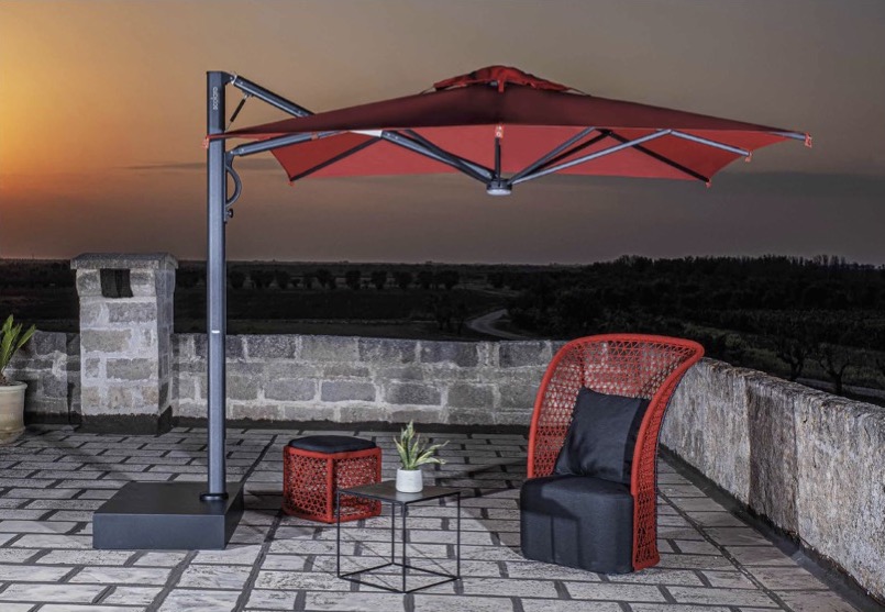 Astro Carbon Scolaro umbrella on one terrace at night